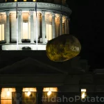 Glowtato hanging in front of State Capitol Idaho Potato Drop Backyard Photogaphy 2024