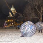 Human hamster wheels enjoyed by two people on New years Eve