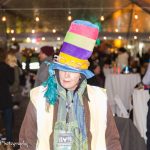 A woman in a colorful tall top had on New Years